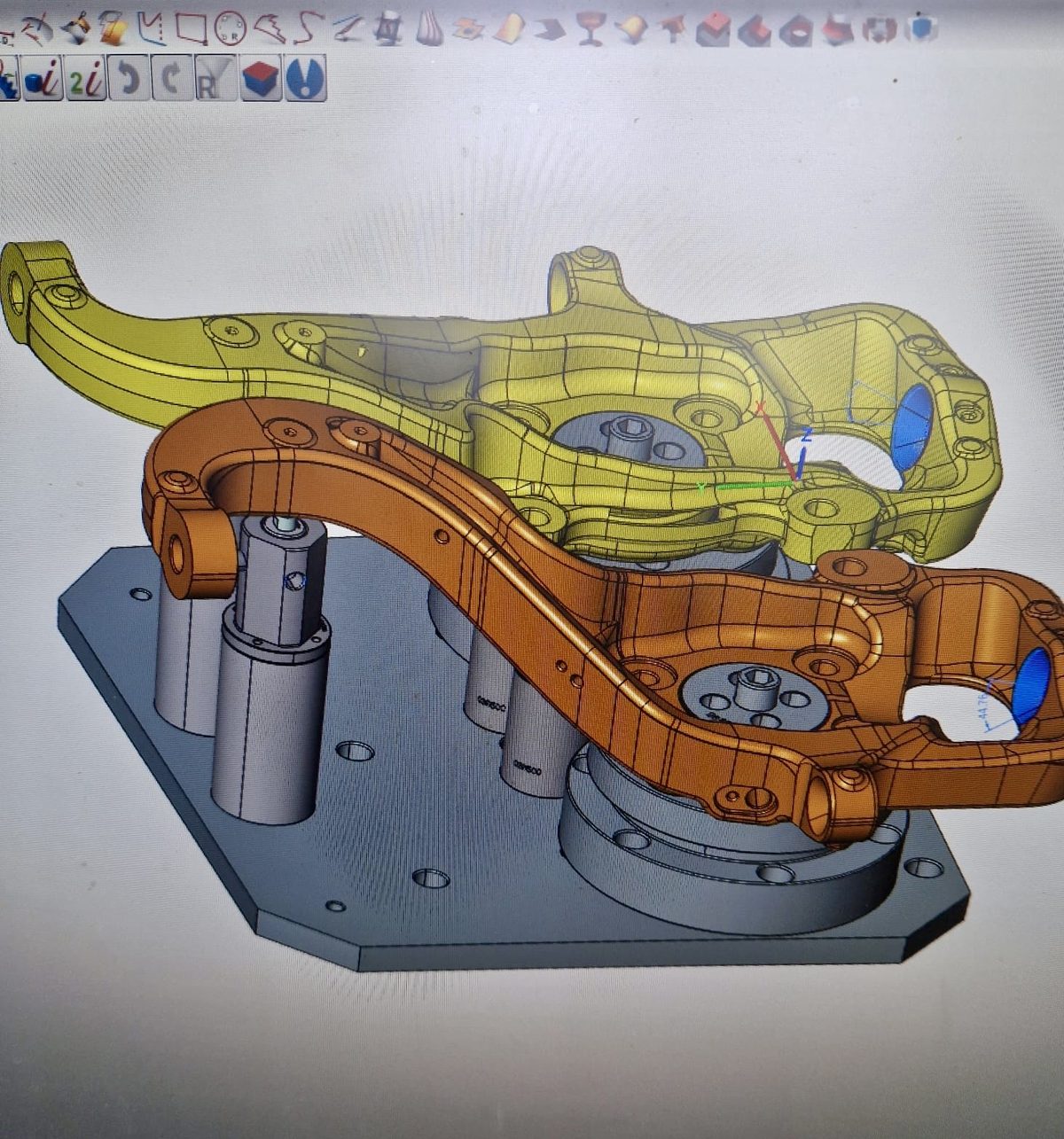 Three-dimensional model of a machined steel assembly reviewed on screen before quoting