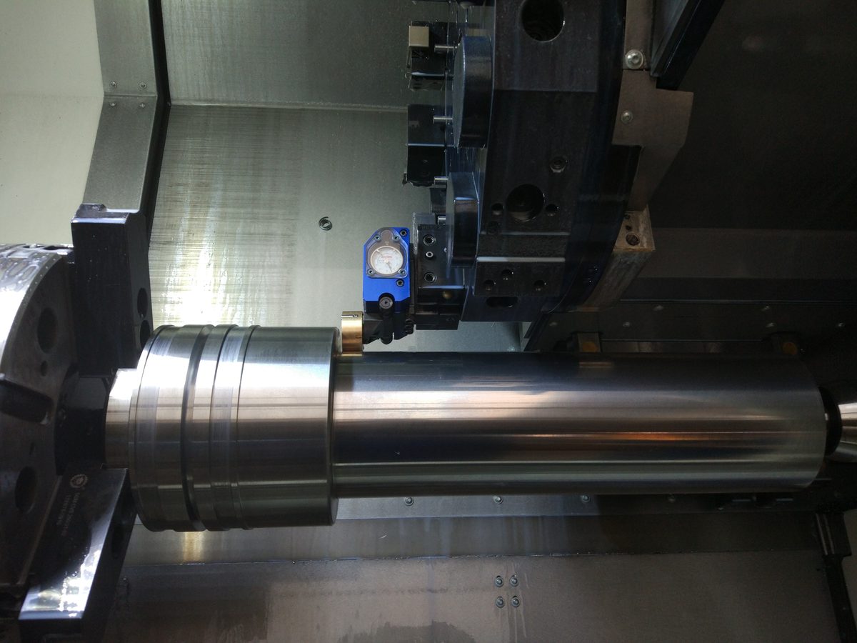 Touch probe measuring a large machined roller in the machine before release