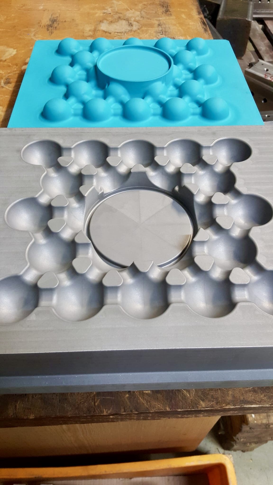 Two halves of a stainless process mould after machining