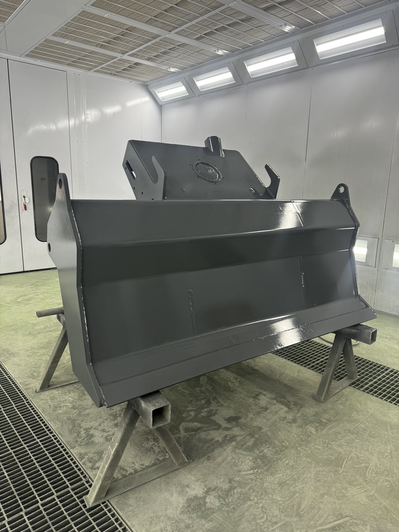 Off-highway loader bucket after painting in the paint booth